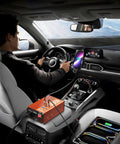 Man driving with Straight Up Reliable 300W Car Power Inverter DC 12V To 110V AC Converter in car, charging devices.