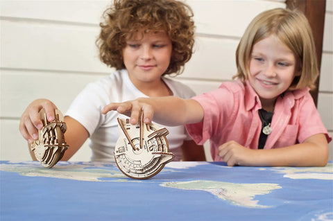 STEM Lab Math Series Curvimeter Puzzle Kit With App Unique Educational Engineering 3D Puzzles For Hands On Learning Map Measurer Toy That Lets You Measure Curved Lines kids using wooden curvimeter puzzle on map
