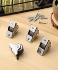 Heavy Duty Mini Caster Wheels 4 Pack For Cabinet Doors And Wardrobe Slide Rails Smoother Than Grease TPR Rollers displayed on a wooden surface.