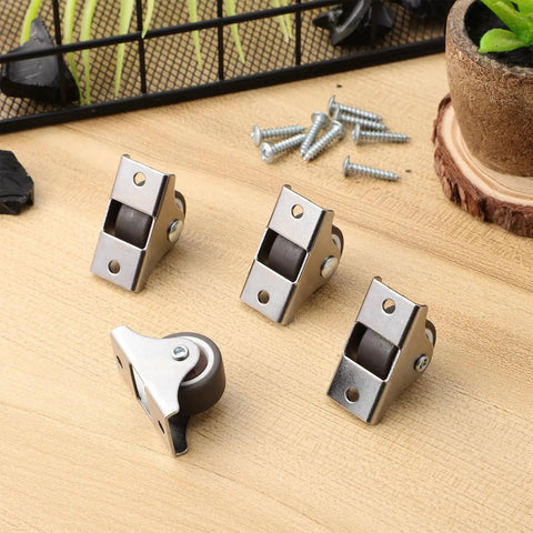 Heavy Duty Mini Caster Wheels 4 Pack For Cabinet Doors And Wardrobe Slide Rails Smoother Than Grease TPR Rollers displayed on a wooden surface.