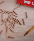 Heavy Duty Xxl Wood Dowels 10X40Mm For Furniture Assembly, pack of 400, solid beech wood connectors on wooden surface.