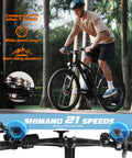 Person riding Gnarly Urban Electric Mountain Bike For Adults And Teens with 28 MPH Peak, 21 Speed Gearing in a forest.