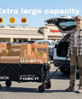 Woman using 46.6 Inch Heavy Duty Collapsible Wagon Cart With 440 Lb Capacity And Beefy All Terrain Wheels for grocery shopping