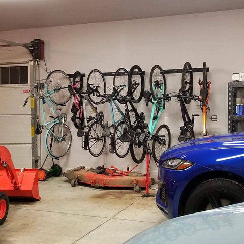 Beefy Four Bike Wall Mount Storage Rack Built From Solid Steel With Heavy Duty Garage Grade Construction Holds Up To 200 Lbs Across Four Bikes