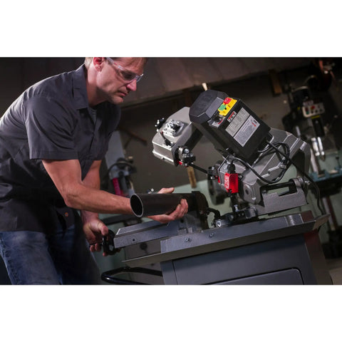 5 By 6 Inch Mitering Bandsaw With Variable Speed, Half Horsepower, 115V Single Phase, Fully Adjustable Ball Bearing Guides, No Fuss Dial Speed Change, Cast Head Swivels To 45 And 60 Degrees, Wheels For Easy Mobility