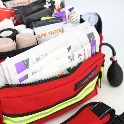 Lightning X mid-sized EMT bag LXMB25, red with reflective stripes and stocked EMS supplies