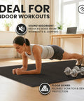 Woman doing planks on 18 Piece EVA Interlocking Foam Floor Tiles Gym Mat Set in home workout space with dumbbells on mat.