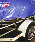 Trailer with blue tarp secured by 15 Pack Tarp Clips For Outdoor Camping And Shelter Setup To Hold Tents Awnings Tarps Banners And Covers With Beefy Grip And Easy Grommet Replacement Made In The USA
