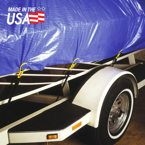 Trailer with blue tarp secured by 15 Pack Tarp Clips For Outdoor Camping And Shelter Setup To Hold Tents Awnings Tarps Banners And Covers With Beefy Grip And Easy Grommet Replacement Made In The USA