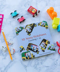 Totally Rad Toddler Counting Book Featuring Ten Noisy Rickshaws And Hella Fun Indian Culture Educational Picture Book on marble surface.