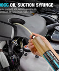 Using 200Cc Fluid Extractor For Cars With Long Extension Tubes And Anti Drip Connector to suction engine oil