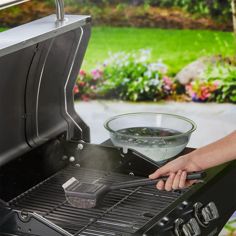 Person using Steam Activated Grill Brush With ArmorTec Bristle Free Mesh Powered By Scrub Daddy For Quick Beast Mode Grate Cleaning