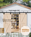 Outdoor Ready 12 Foot Exterior Sliding Barn Door Hardware Kit Box Rail Track For Outdoor Use Beefy Built To Last Heavy Duty Wall Mount System Supports Up To 450 Pounds Fits Double 36 Inch Doors Galvanized Coated For Weather Tough Performance installed on a white barn.