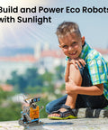 Boy sitting outdoors with 12 In 1 Solar Robot Building Kit For Kids And Teens Aged 8 To 13 Hands On STEM Toy Powered By The Sun