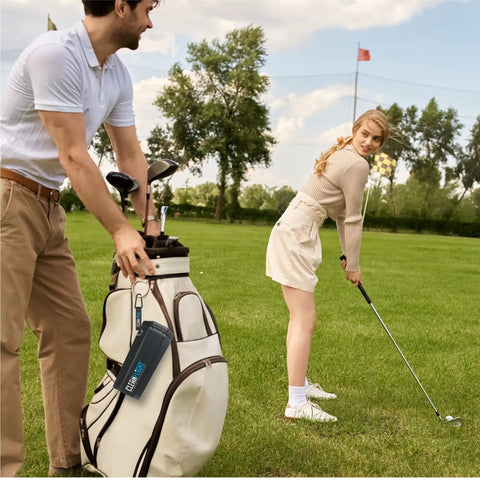 Premium Golf Ball Washer With Variable Hex Brush System Portable Ball Cleaner clipped to golf bag on course