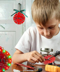 Child using Starter Soldering Kit for Christmas Projects with LED Light Up Tree Decor, Learn Through Hole Soldering and Circuit Basics.