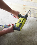 Compact Hammer Drill With Variable Speed Trigger And Reversal Built Lightweight Yet Punchy For Concrete Tasks With One Hand Quick Release Chuck And Rubberized Comfort Grip For All Day Diy Hustle Smooth Home Repair being used to drill into wood.