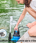 Person using One Half Horsepower Submersible Water Pump With Stainless Steel Base 2450 GPH Portable Sump Pump near pond