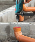 4 Inch PVC Pipe Reamer With Aluminum Body And Stainless Steel Hex Key Shaft used on orange PVC pipe with drill