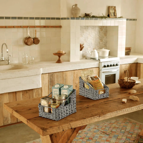 Two Pack Wicker Storage Baskets With Handles Odorless Waterproof Trapezoid Bins on kitchen table