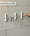 Easy Install Nylon Wall Plug And Screw Kit For Drywall Hollow Brick And Foam Block, Handy For Hanging Art And Mirrors, Lightweight Shelves, Curtain Rods, Towels And More In Indoor Spaces. White nylon plugs and screws in hollow brick wall.