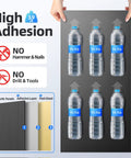4 Pack High Density Acoustic Foam Panels Super Thick Sound Proof Wall Tiles With Self Adhesive Backing displayed with water bottles.