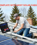 Man using Solar Crimping Tool Kit With 12 MC4 Connectors And Spanner Wrenches For 14 To 10 AWG on rooftop solar panel.