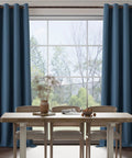 Dark Blue Blackout Linen Textured Curtains Set for Living Room and Bedroom, Lightweight Grommet Top Panels, 100 Percent Blockout Sunlight and UV Rays installed in a dining room, two panels 37 inches wide by 84 inches long