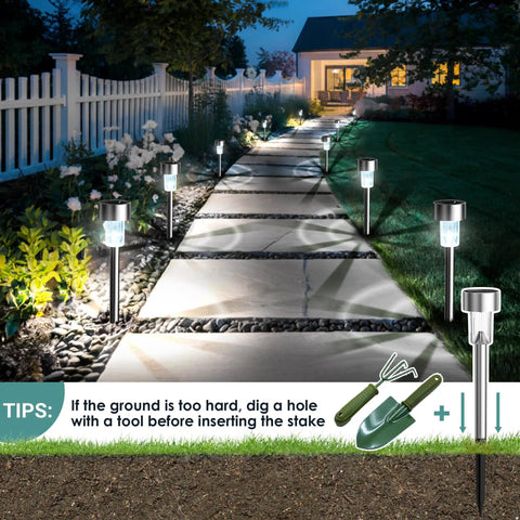 12 Pack Outdoor Solar Lights Stainless Steel Garden Pathway Lights Waterproof illuminating a night garden path