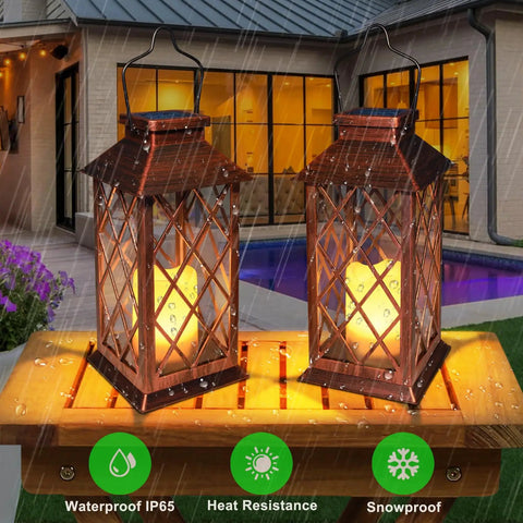 10 Inch Solar Outdoor Lanterns Set Waterproof Flickering Flameless Candles on table under rain