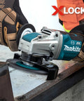 X-Lock Quick Change Carbon Steel Crimped Wire Wheel Brush Four And A Half Inch for angle grinders in use on metal surface
