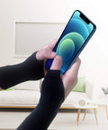 Person wearing Wrist Thumb Compression Arthritis Gloves 1 Pair Breathable Wrist Support Fingerless Glove With Gel Thumb Pads using a phone