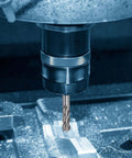 Installed carbide end mill in CNC spindle, 4-flute, 13 mm diameter, straight shank