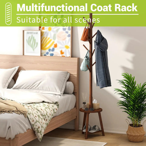 Freestanding Bamboo Coat Rack With Two Shelves And Eight Hooks, Easy Assembly, 12.6 Inch Storage Tray, Four Height Options next to bed.