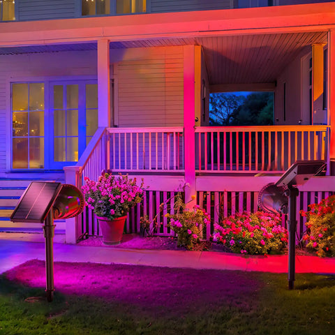 Colorful evening glow from Solar Spotlights Outdoor 600LM Set Of 2 Waterproof Landscape Lights illuminating garden path.