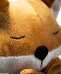 Close-up of fox shaped plush door stopper with cotton filling, heavy duty proofing pinch guard, scratch prevention for home