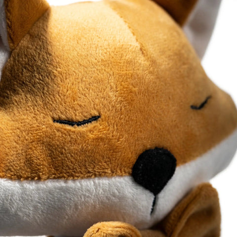 Close-up of fox shaped plush door stopper with cotton filling, heavy duty proofing pinch guard, scratch prevention for home