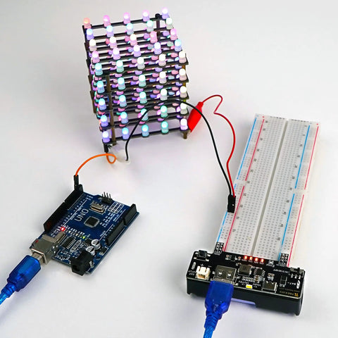 Dope Two Pack Breadboard Power Supply Module With USB C Charging 3.3V And 5V Rails Type A Output next to Arduino board and LED cube.