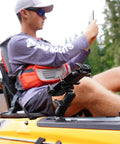 Medium Double Socket Arm For B Size 1 Inch Ball Components mounted on kayak, holding a smartphone. Adjustable mount in use outdoors.