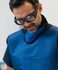 Man wearing Fitover Radiation Safety Glasses Large Black Plastic Frame With Permanent Side Shields in a lab setting
