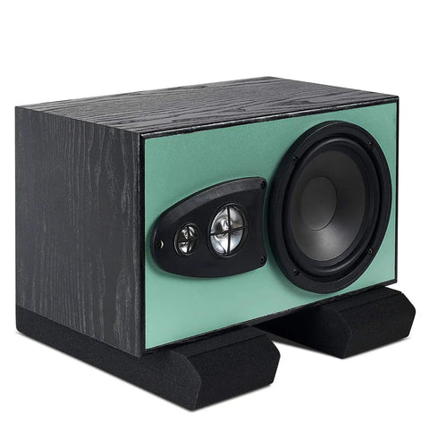 Studio Monitor Isolation Pads For Home Studios, Heavy Duty Acoustic Foam Cushions That Cut Vibration And Rattle, Fits Most 5 to 12 Inch Monitors And Subwoofers shown with monitor on pads