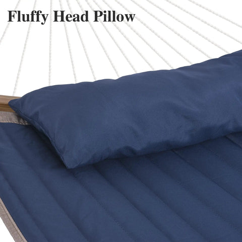 Close-up of navy blue head pillow on a freestanding hammock with quilted polyester fabric, part of a Navy Blue Free Standing Outdoor Hammock Set.