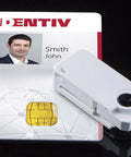 SCR3500 USB Smart Card Reader For ID1 ISO 8716 Cards next to an ID card on a black surface