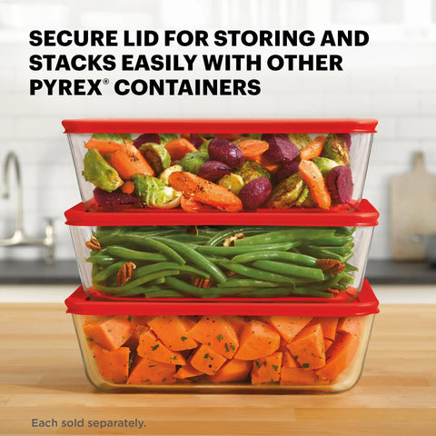 Three stacked Big 11 Cup Glass Food Storage Container With Snug BPA Free Lid For Leftovers And Meal Prep filled with vegetables