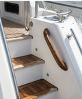 Premium Teak Handrail With Pre Drilled No Sweat Mounting For Tight Spaces Versatile Wall Grip Providing Solid Safety Support For Bathrooms Decks And Outdoor Porches Real Deal Quality on boat steps, showcasing durable teak material and compact design.