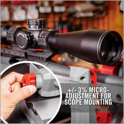 Close-up of One-Hand Clamp Gun Workstation with non-marring yokes, leveling knob for scope mounts, adjustable travel