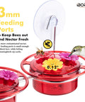 Window Hummingbird Feeder With Strong Suction Cup For Outdoors Bee Proof Feeding Ports And Stainless Steel Base 3Oz Capacity Mini Hummingbird Feeder Ideal For Kitchen Sill Or Patio View 2025 Update, showing red feeder with feeding ports and suction cup