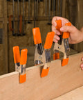 Heavy Duty Spring Clamp Set 4-Inch And 6-Inch Clamps With 1-Inch And 2-Inch Jaw Openings used for securing wood in DIY project