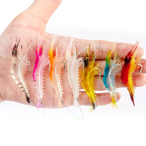 14 Piece Glow In The Dark Shrimp Lures Set With Bait Box 7 Color Premium Soft Shrimp Tackle displayed on a hand.