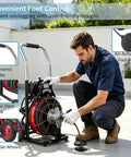 Heavy Duty Electric Sewer Auger And Drain Cleaner Machine Featuring 100 Ft Half Inch Steel Cable And 550W High Torque Motor used with foot control by a technician.